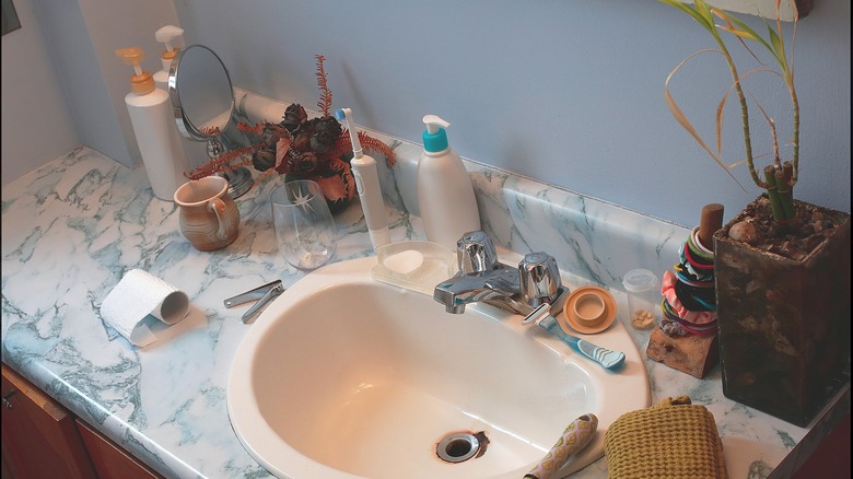 Cluttered bathroom counter