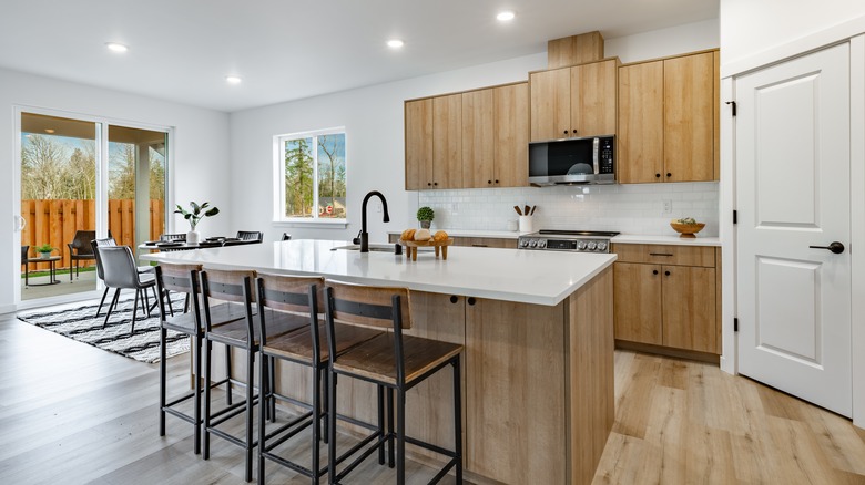 Finished kitchen with wooden-looking cabinets