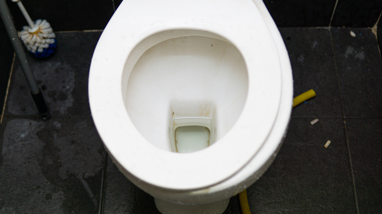 The Butter Knife Hack That Will Leave Your Grimy Toilet Crevices Sparkling