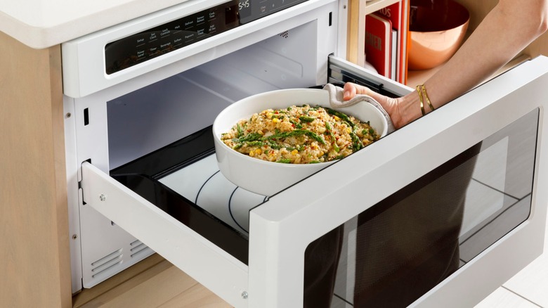 A close-up of the Cafe Drawer Microwave when open