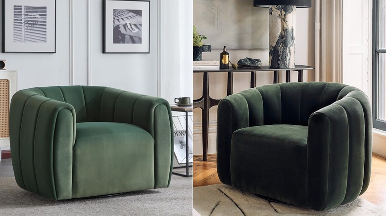 Two green velvet arm chairs side by side.