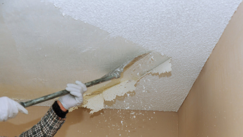 Scraping away a ceiling's popcorn texture