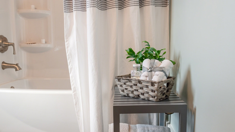 Bathroom with patterned shower curtain