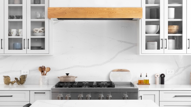 kitchen with marble slab backsplash