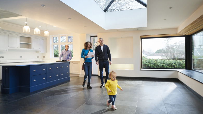 Couple looking at open house