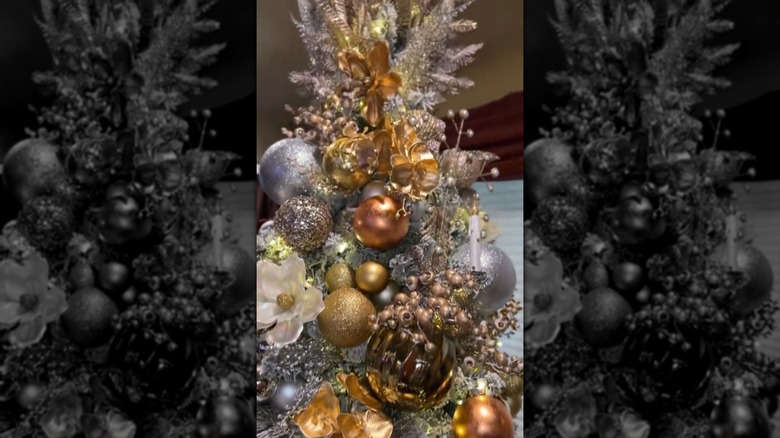 A Christmas tree with mixed metallics and textures