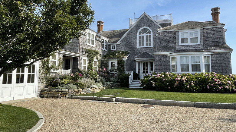 A luxurious home in Nantucket with a gravel driveway