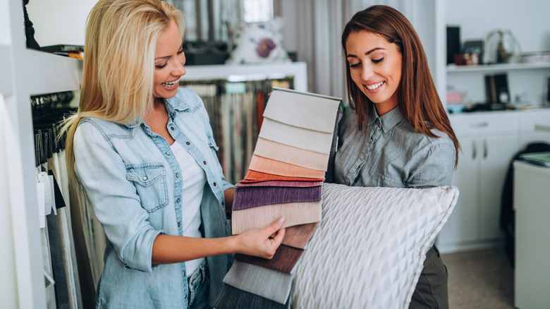 Person choosing fabrics