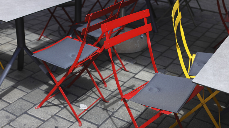 Red folding chairs outside