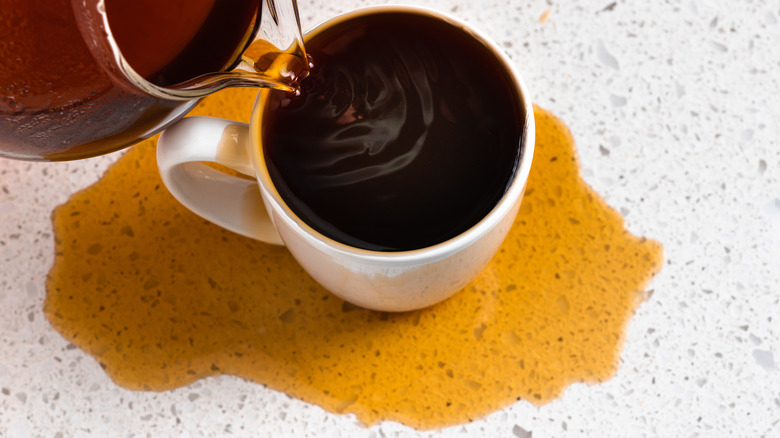 coffee spilling onto counter