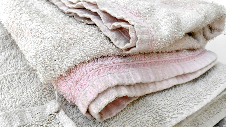 Old stiff towels in a stack
