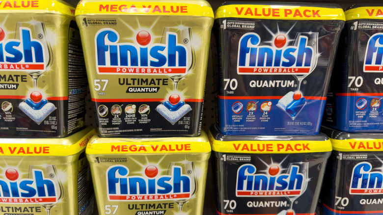 Two rows of Finish dishwasher detergent pods on shelves
