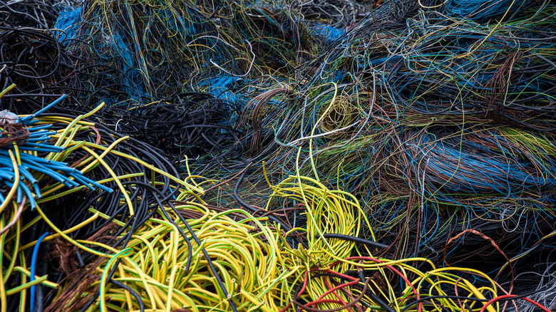 A mass of multicolored scrap wire in a pile