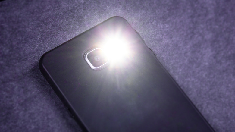 Cell phone with LED flashlight on