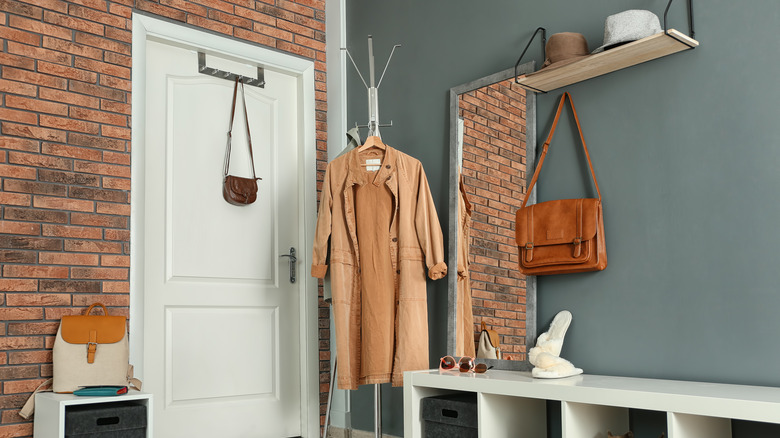 entryway with coat and bag 