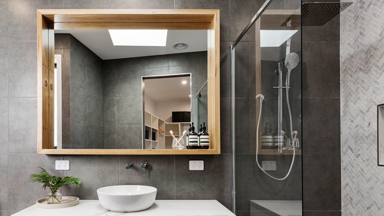 Rectangular mirror above bathroom vanity