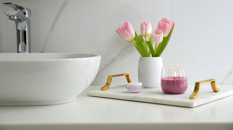 catcall tray on bathroom counter