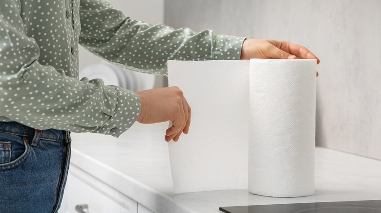 pulling paper towel from roll