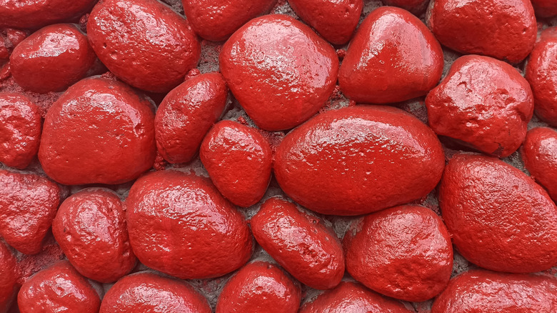 Close-up of red-painted rocks