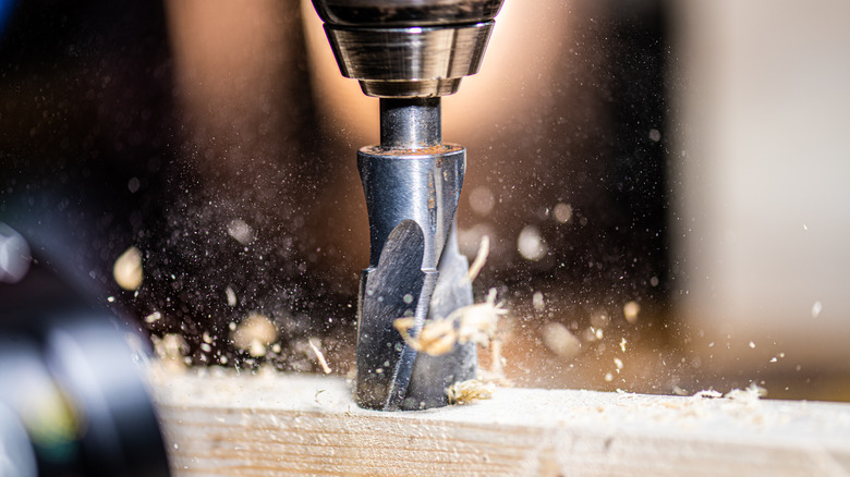 close up drilling wood hole