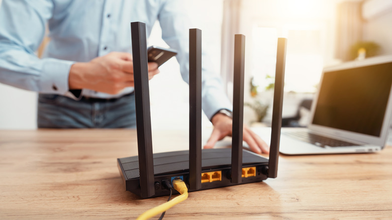 person setting up a router