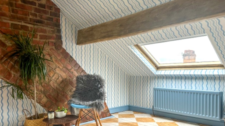wallpaper drenched room with stripe wallpaper ceiling and checkerboard floors