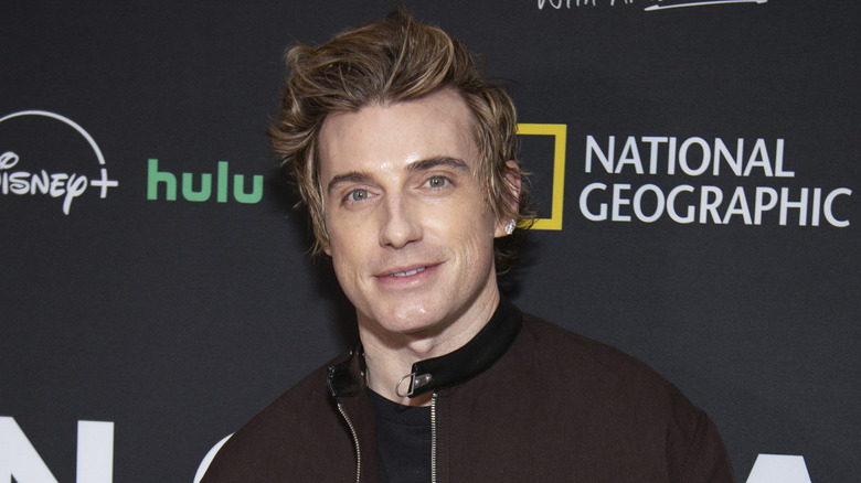 A headshot of celebrity designer Jeremiah Brent at a red carpet event.