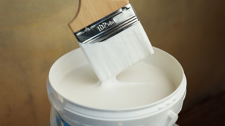 bucket of white paint 