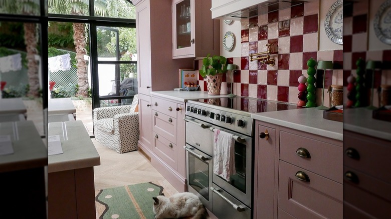 Red and pink checkered kitchen backsplash in colorful kitchen