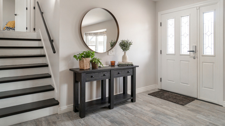 Home with a fitting entryway table