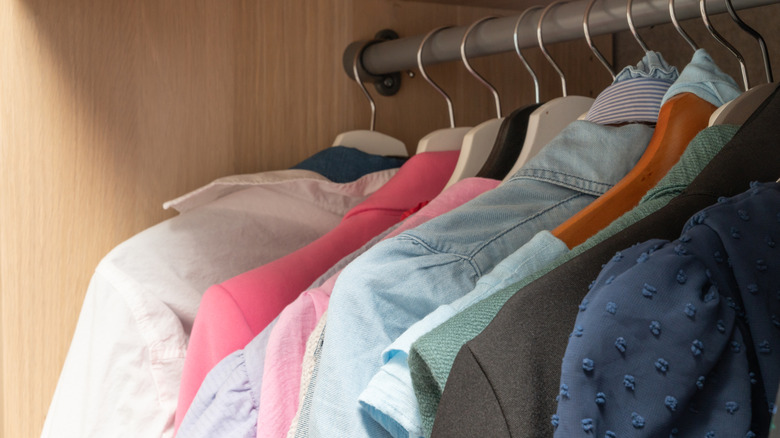Clothing hanging in closet