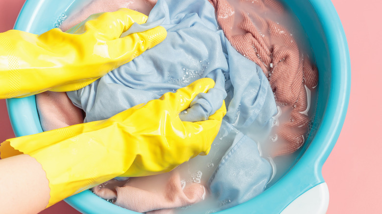 Hand washing laundry