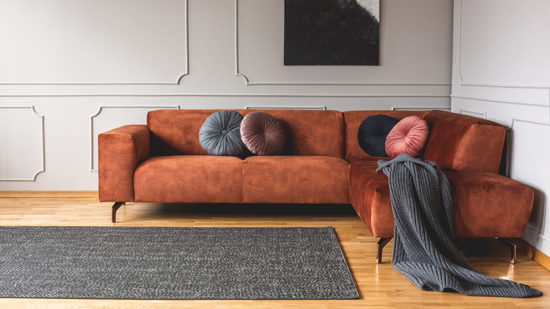 suede corner sofa in room