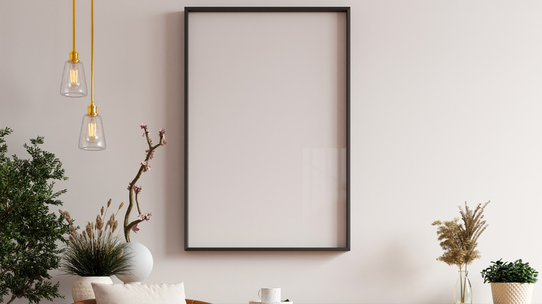 Empty frame on the wall waiting for art