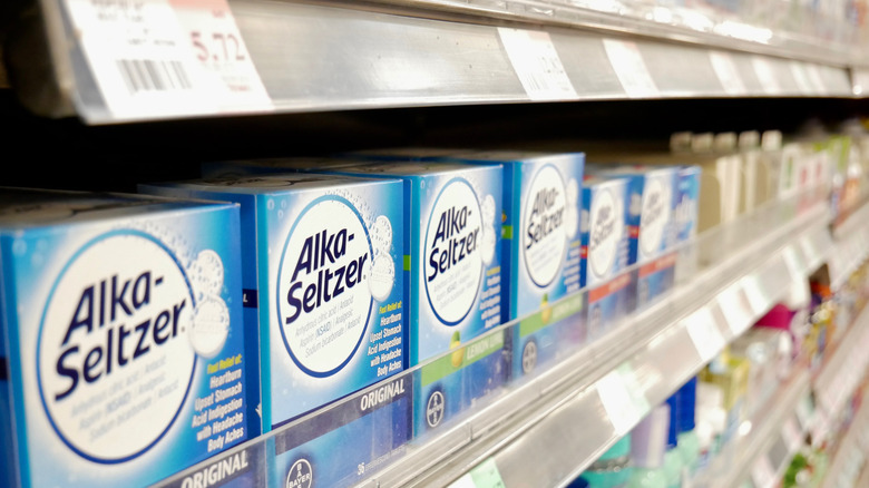 Alka-Seltzer stocked on Vitamin shelf at retail store.