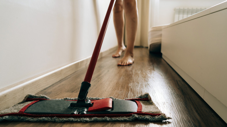 Dry-mopping a vinyl floor