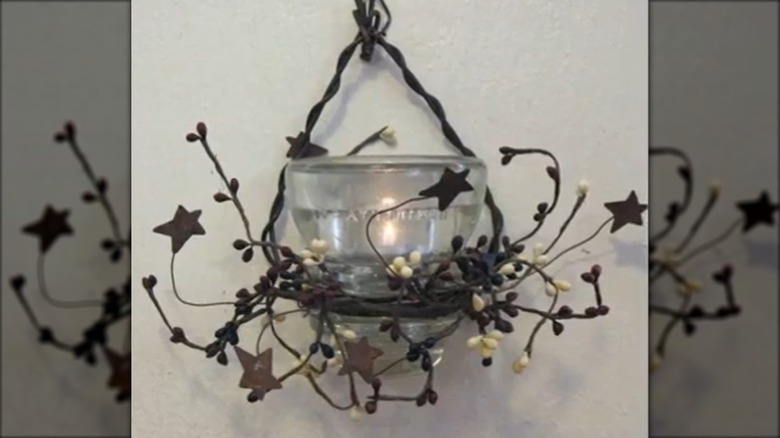 Glass insulator wall sconce