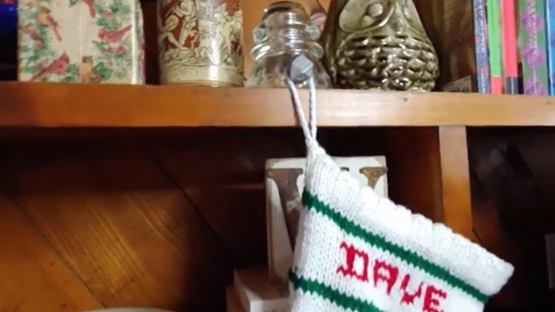 Glass insulator stocking hanger upcycle
