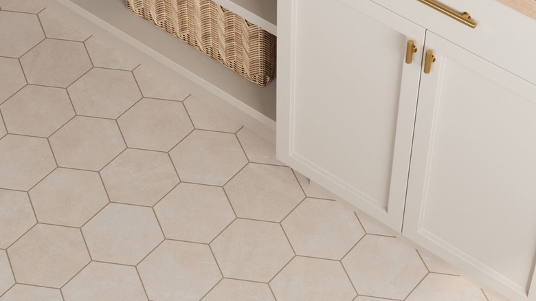 cream concrete-inspired hexagon tiles in bathroom