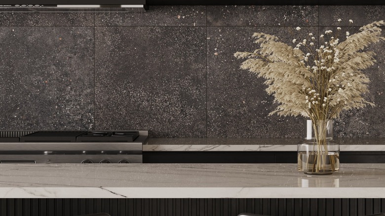 charcoal cement-inspired porcelain tiles for backsplash in kitchen