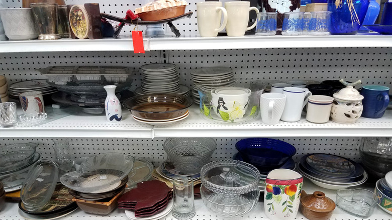 Shelves in a thrift store of kitchenware