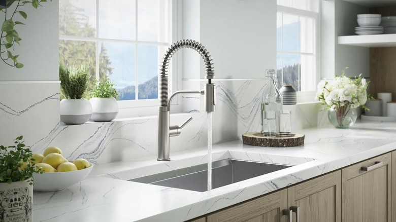 The Kohler Provo Semi-Pro Kitchen Faucet when turned on
