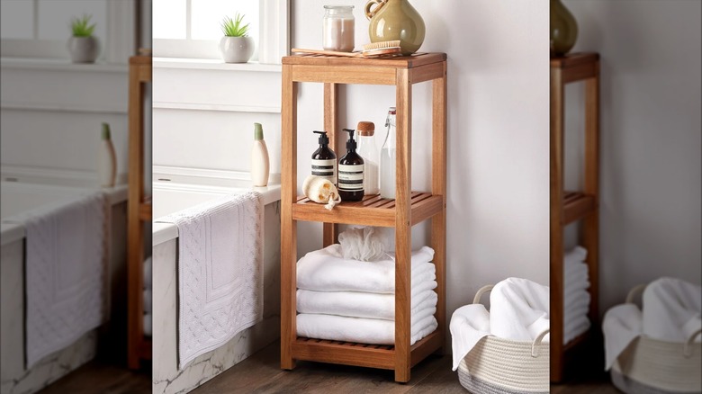 Mesa tiered shelf holding bathtub essentials
