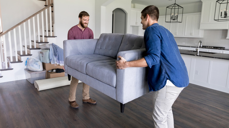 men moving a couch