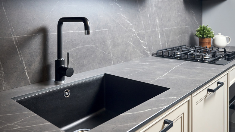 Matte marble countertops in modern kitchen