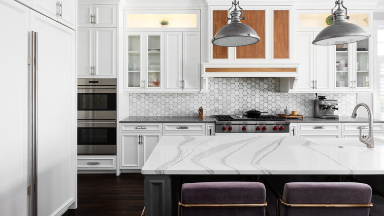 marble kitchen island countertop in luxe white and black kitchen design