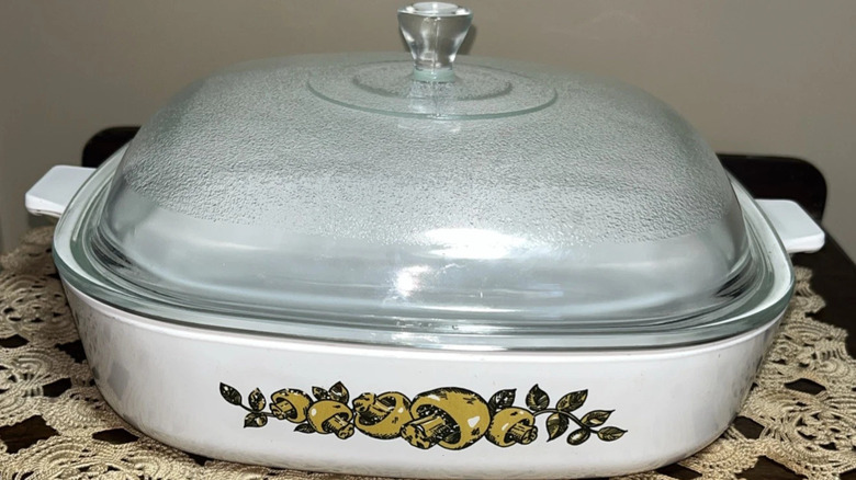 a covered casserole dish from CorningWare in the Nature's Bounty print