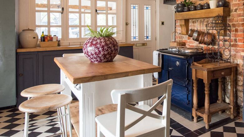 Cottage kitchen with brick accents