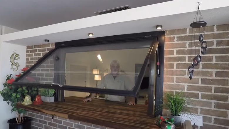Serving window with plants 