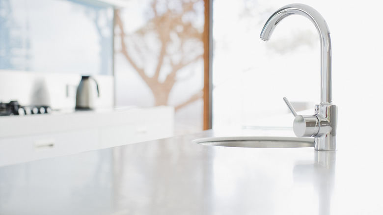 Plain white kitchen sink countertop